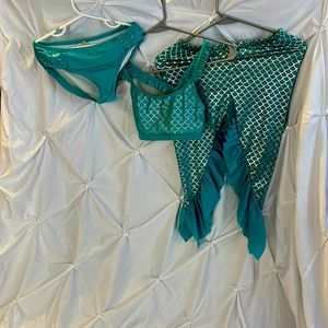 I am selling a three piece mermaid swimsuit kids